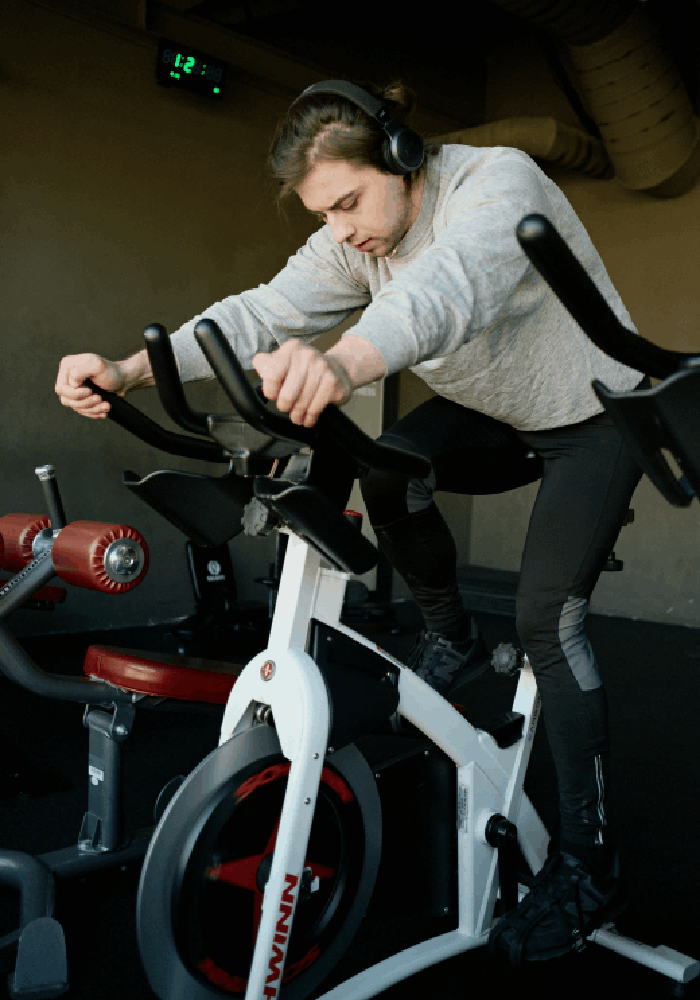 woman-doing-exercise-on-a-machine-in-a-gym