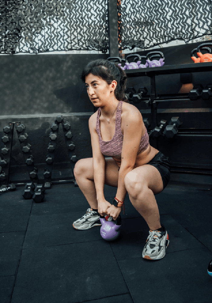 woman-doing-exercise-on-a-machine-in-a-gym